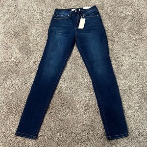 high rise skinny jegging material like jeans no rips size 5/26 dark wash